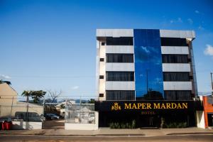 a building with a sign that reads merge margarita at MAPER MARDAN in Parauapebas