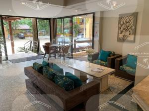 Χώρος καθιστικού στο Flat Perfeito Flat Amarilis em Riviera São Lourenço com café da manhã e enxoval completo toalhas praia e piscina com trocas