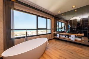 Um banheiro em Hotel Antonio II