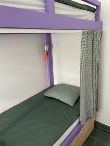 Postel nebo postele na pokoji v ubytování Hostal Bubango