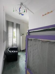 Postel nebo postele na pokoji v ubytování Hostal Bubango