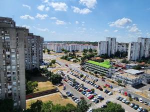 an aerial view of a parking lot in a city at Morning Wood - Panorama in Belgrade