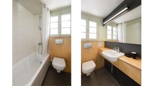 a bathroom with a sink and a toilet and a bath tub at Rose Willow, Vourvourou #FeelsLikeHome in Vourvourou +7 photos