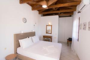 Ένα ή περισσότερα κρεβάτια σε δωμάτιο στο Rena Apartments