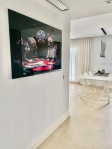 Et tv og/eller underholdning på La Cala Golf - Luxury 3bed apartment - First line golf view