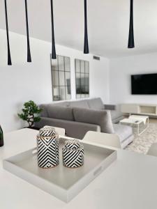 Гостиная зона в La Cala Golf - Luxury 3bed apartment - First line golf view
