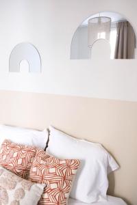 Letto o letti in una camera di Villa Adèle, Bow-Window vue Mer - Appt 02