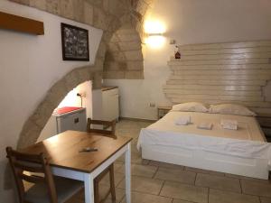 Posteľ alebo postele v izbe v ubytovaní Don Nicola Tourist Location