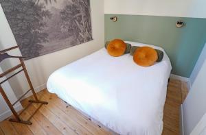 Posteľ alebo postele v izbe v ubytovaní Villa Adèle, Sauna et Balcon vue Mer - Appt 03