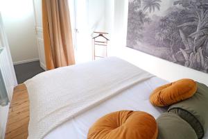 Posteľ alebo postele v izbe v ubytovaní Villa Adèle, Sauna et Balcon vue Mer - Appt 03