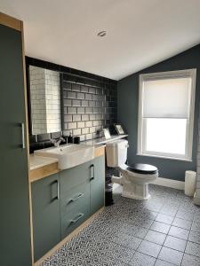 a bathroom with a sink and a toilet at River View in Keynsham