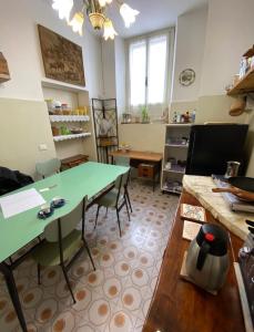 Kuchyň nebo kuchyňský kout v ubytování B&B LaMaGia di Corte Moronati