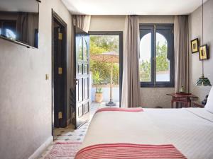 Letto o letti in una camera di Dar Jasmine