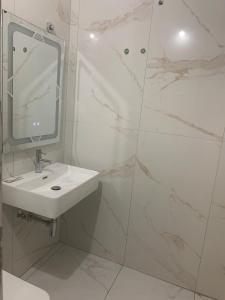 Koupelna v ubytování Hotel Kaloshi