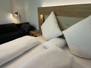 Postel nebo postele na pokoji v ubytování Ferienwohnungen Fellhornblick