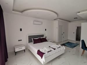 Postel nebo postele na pokoji v ubytování alternatif villaları 3