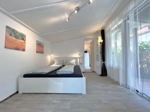 Voodi või voodid majutusasutuse Liget Holiday Home toas