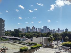 a view of a city skyline with tall buildings at Flat 203 Clarice Lispector, Ilhotas- Teresina in Teresina