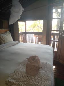 Postel nebo postele na pokoji v ubytování Nako Okavango Guesthouse