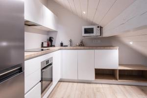 Køkken eller tekøkken på K2 Annecy Rent Lodge duplex de deux chambres doubles entièrement rénové
