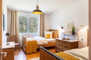 Letto o letti in una camera di Maierhof 341