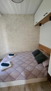 Katil atau katil-katil dalam bilik di Apartmani PART