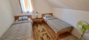 Postel nebo postele na pokoji v ubytování Apartman Muratagic