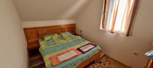 Postel nebo postele na pokoji v ubytování Apartman Muratagic