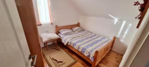 Postel nebo postele na pokoji v ubytování Apartman Muratagic