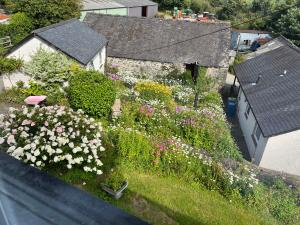 an aerial view of a garden with flowers at Staylittle Farm in Dolgellau