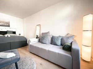 Posezení v ubytování Zentrales Apartment mit TV, Küche und Mikrowelle