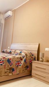 Giường trong phòng chung tại La Casa di Marta
