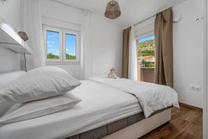 Posteľ alebo postele v izbe v ubytovaní Villa Jelena + 37 fotografií
