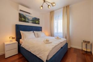 En eller flere senge i et værelse på Villa Bella Split - Podstrana