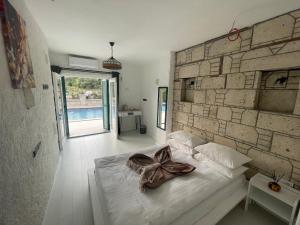 Postel nebo postele na pokoji v ubytování ALAÇATI XL LUXURY HOTEL