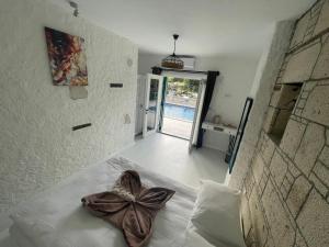 Postel nebo postele na pokoji v ubytování ALAÇATI XL LUXURY HOTEL