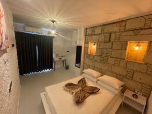 Postel nebo postele na pokoji v ubytování ALAÇATI XL LUXURY HOTEL