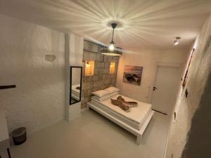 Postel nebo postele na pokoji v ubytování ALAÇATI XL LUXURY HOTEL