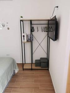 Postel nebo postele na pokoji v ubytování MaaR Estudio 7, a 2 cuadras del Malecón de La Paz