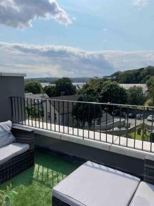a balcony with a view of a street at ROOMZ TOWNHOUSE NO 20 in Portaferry
