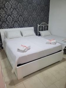 Postel nebo postele na pokoji v ubytování Casa la chicca