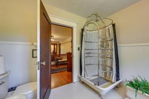 an open door with a glass shelf in a room at Historic Auburn House on 37 Acres with Private Lake! in Auburn +38 photos