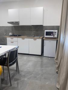 A kitchen or kitchenette at Casa del Credente