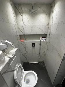 Ett badrum på Tech apartment