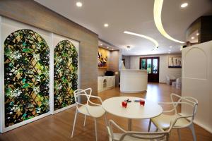 Kuchyň nebo kuchyňský kout v ubytování FAVIGNANA HOTEL Concept Holiday