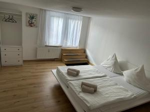 Giường trong phòng chung tại Ferienwohnung Cavallino 2