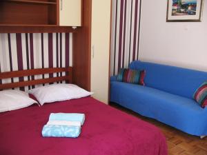 Postel nebo postele na pokoji v ubytování Apartments Niksa