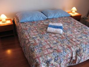 Postel nebo postele na pokoji v ubytování Apartments Niksa