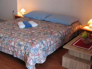 Postel nebo postele na pokoji v ubytování Apartments Niksa