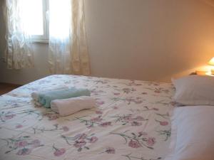Postel nebo postele na pokoji v ubytování Apartments Niksa